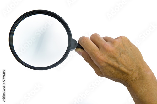 Magnifying glass in woman hand
