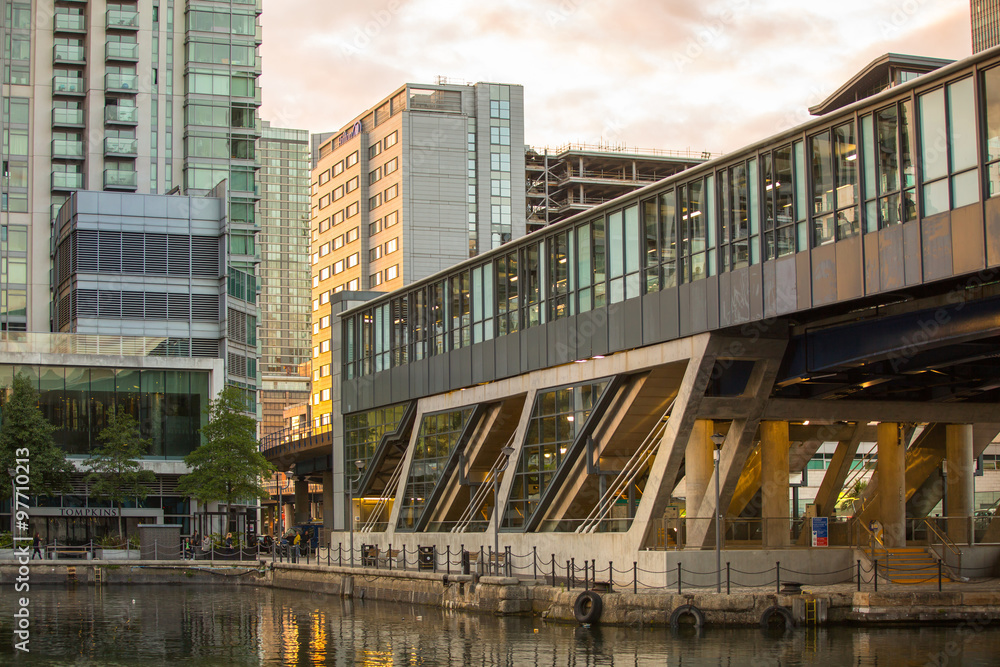 LONDON, UK - SEPTEMBER 9, 2015: Canary Wharf office buildings at sunset