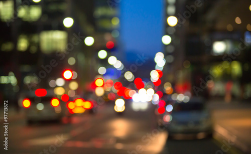 Blurred background of night city with lots of lights reflections. Template for designer's projects