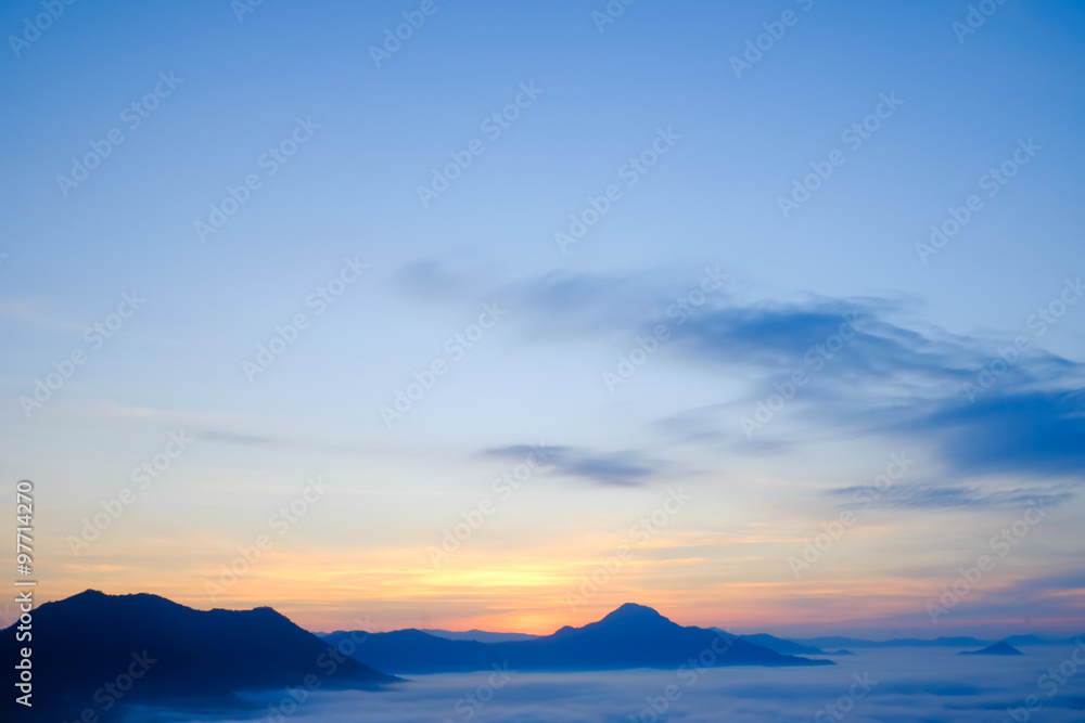 Fog covering mountain in the moring Fog covering mountain in the moring