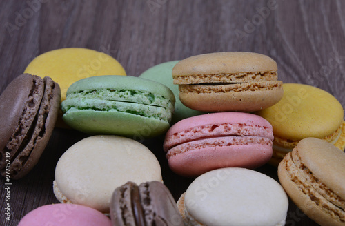 Macaron with wooden background photo