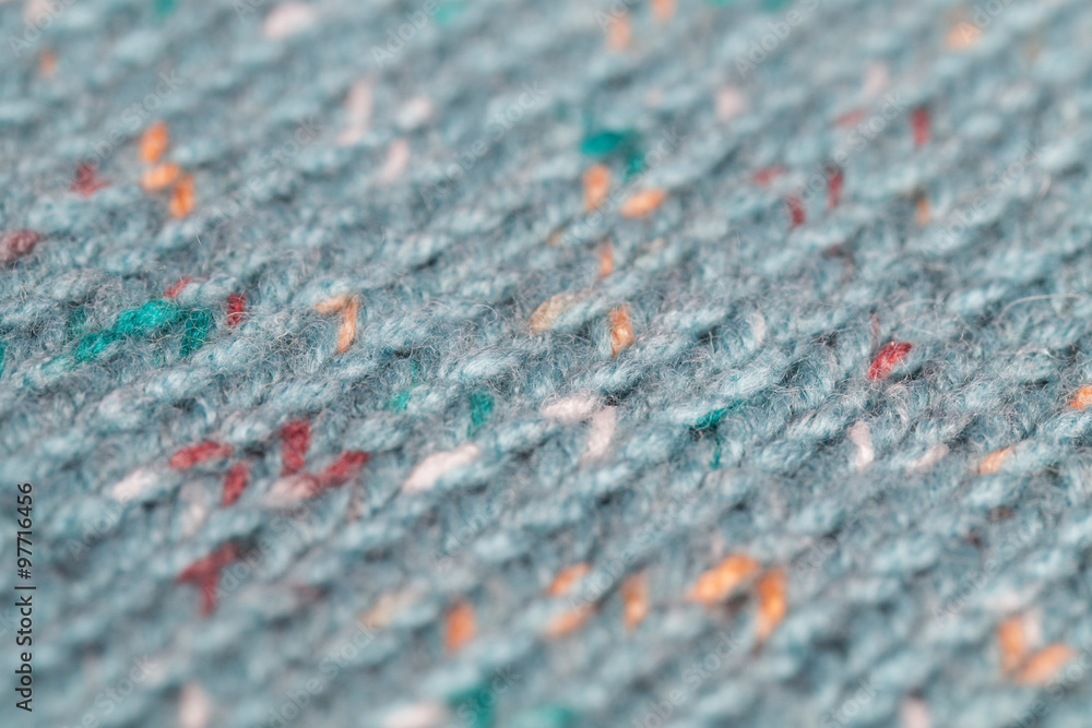 The front loop knitted on a colored canvas The front loop knitted on a colored canvas