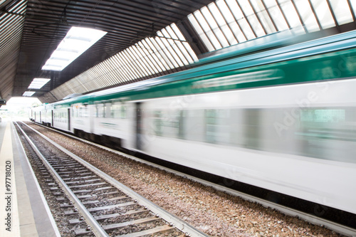 Fototapeta Naklejka Na Ścianę i Meble -  Fast Passenger Commuter Train with Motion Blur