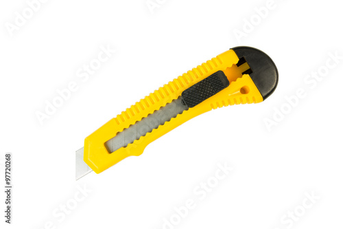 Stationery knife yellow and black. Isolated on a white background. Tools series.