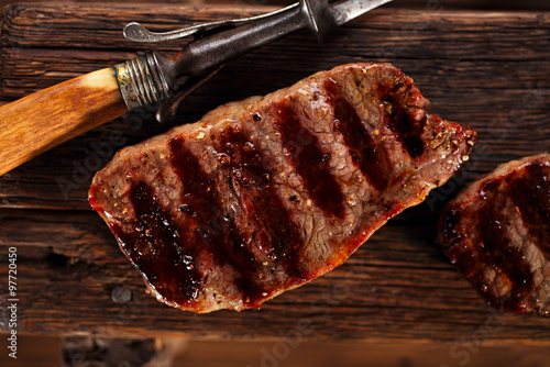 beef steak with vintage meat fork