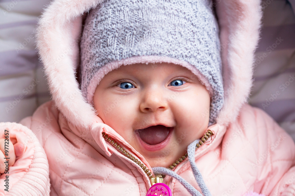 Portrait of baby girl in winter jacket and hat Portrait of baby girl in winter jacket and hat