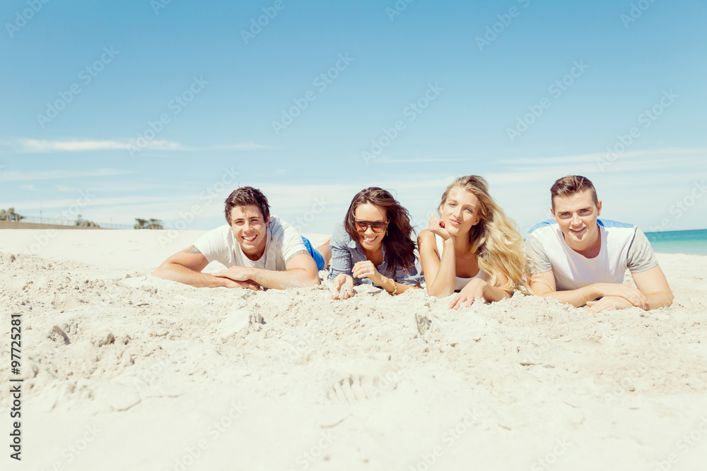 Company of young people on the beach Company of young people on the beach