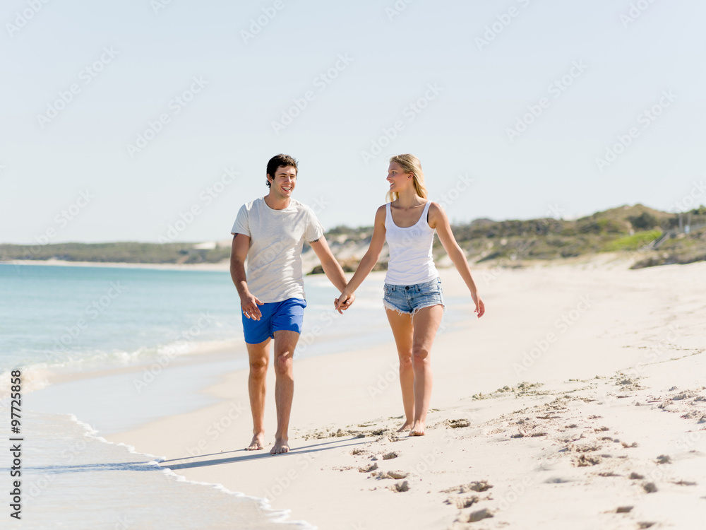 Romantic young couple on the beach