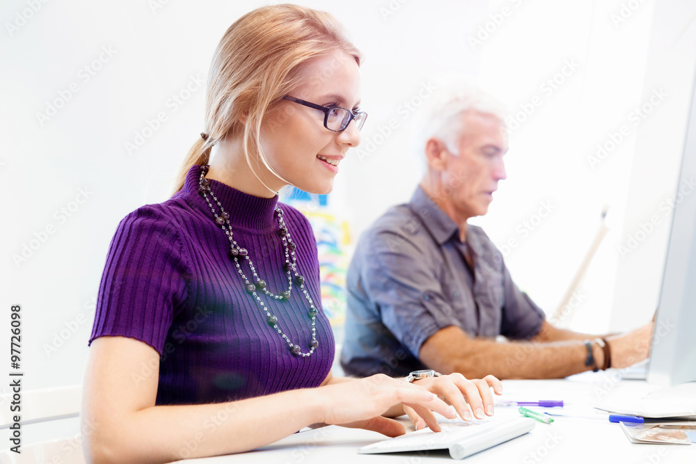 Co-workers working together Co-workers working together