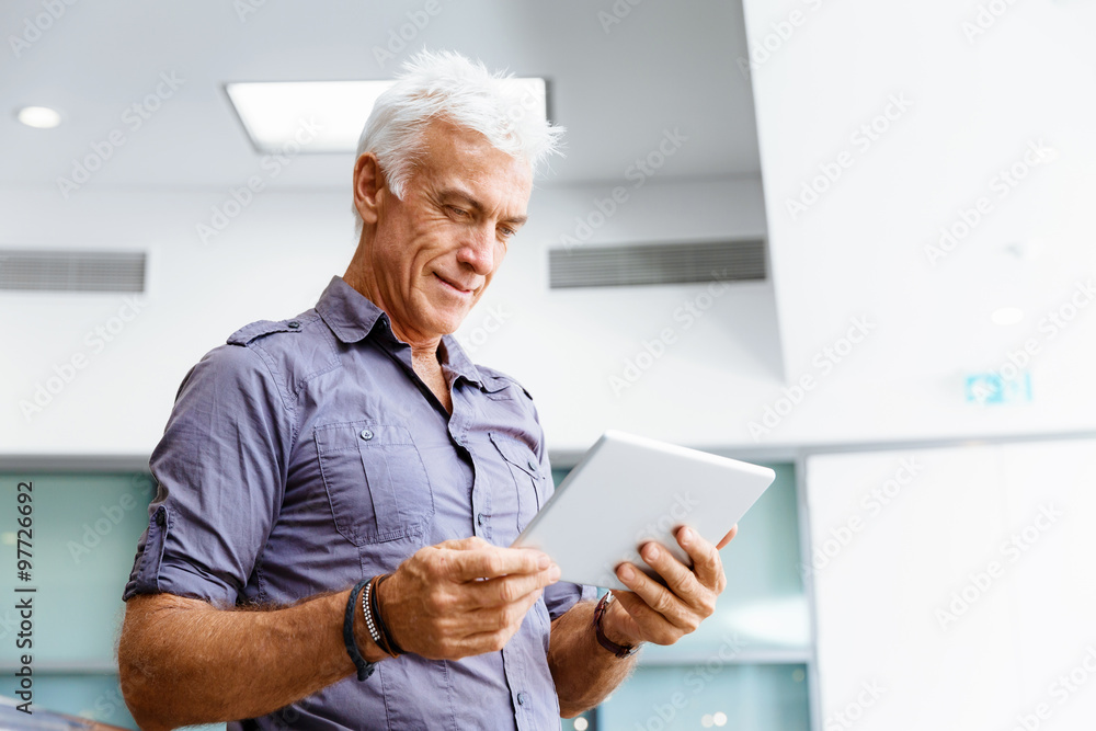 Handsome businessman in office Handsome businessman in office
