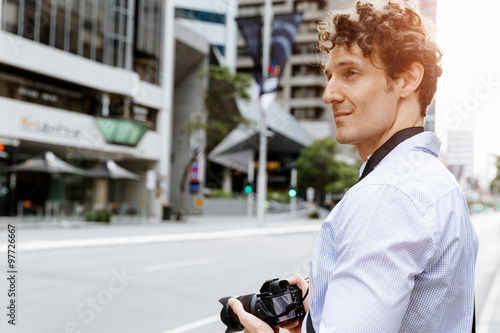 Male photographer taking picture