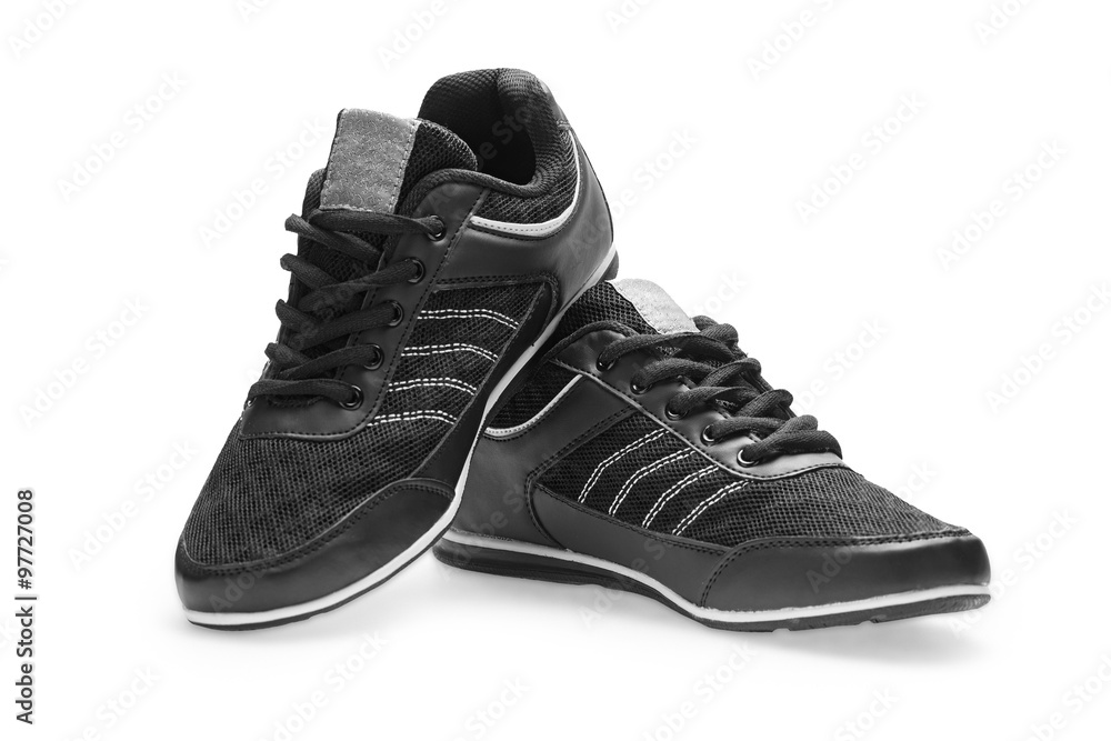 A pair of black sports shoes with shoelace A pair of black sports shoes with shoelace