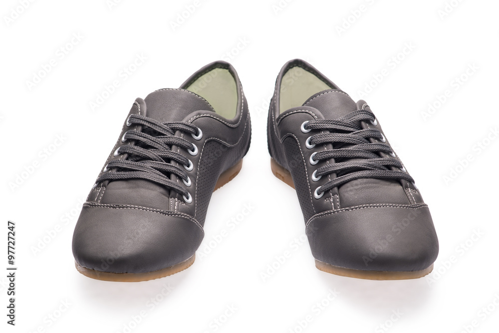 A pair of black sports shoes with shoelace A pair of black sports shoes with shoelace
