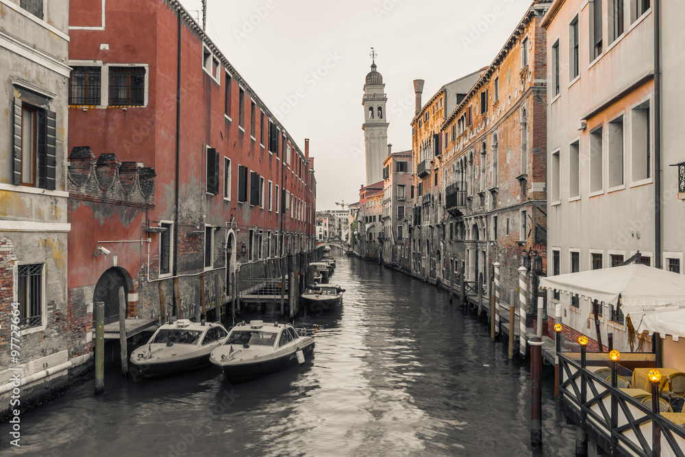 Venetian canal among old houses in Venice, Italy Venetian canal among old houses in Venice, Italy