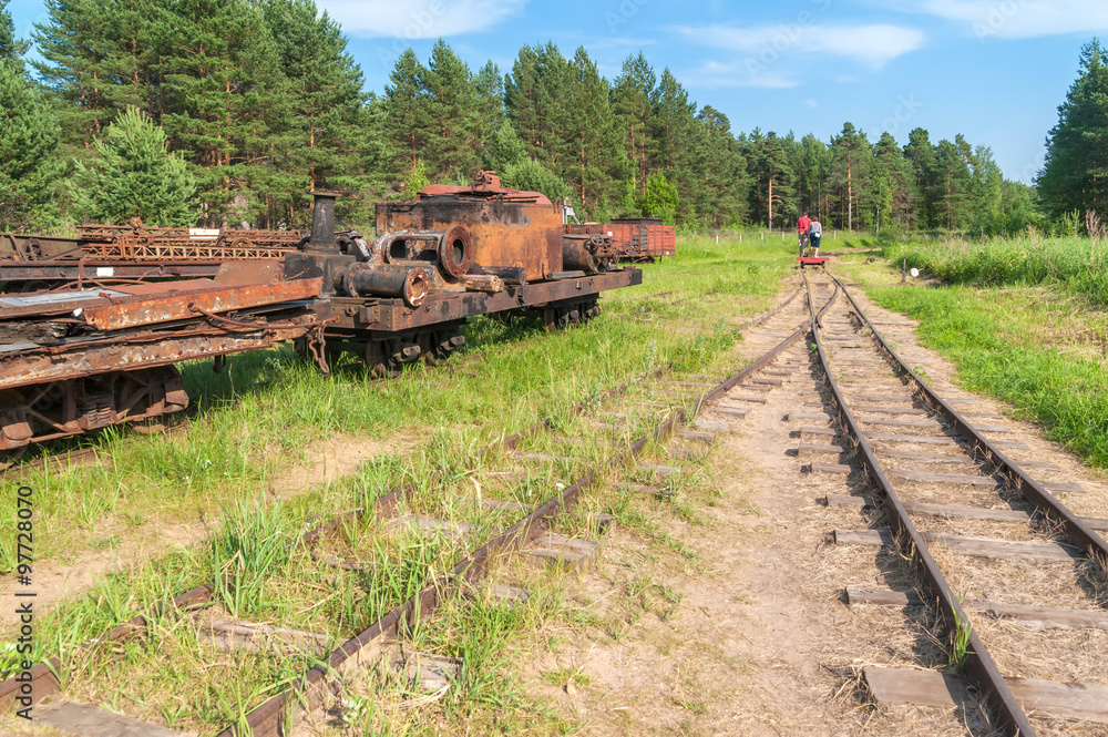 Old rusty waggonage, carriage and wagon with railway before. Talitsy, Yaroslavsky region, Russia.
Old rusty waggonage, carriage and wagon with railway before. Talitsy, Yaroslavsky region, Russia.