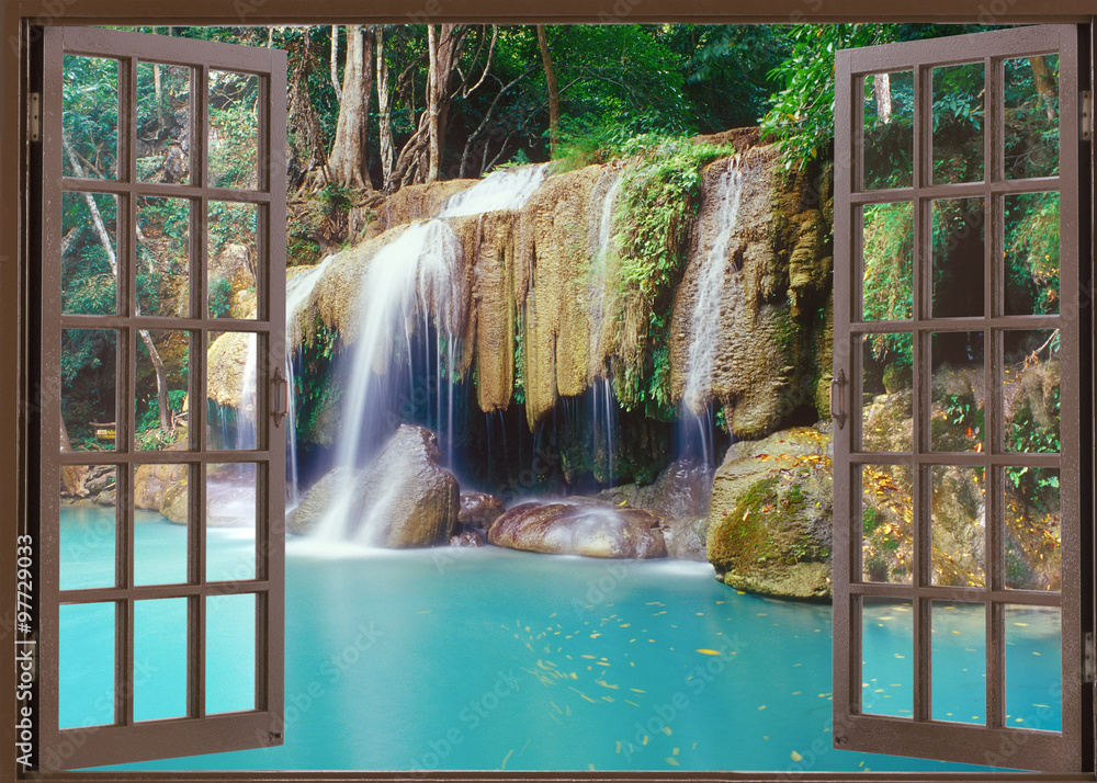 Fototapeta Otwórz widok okna na głęboki wodospad w dżungli