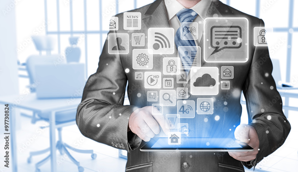 Business man using tablet PC with social media icon set Business man using tablet PC with social media icon set