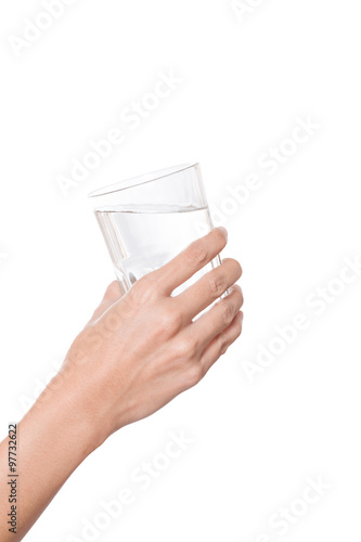Woman hand with glass of water isolated on white background
