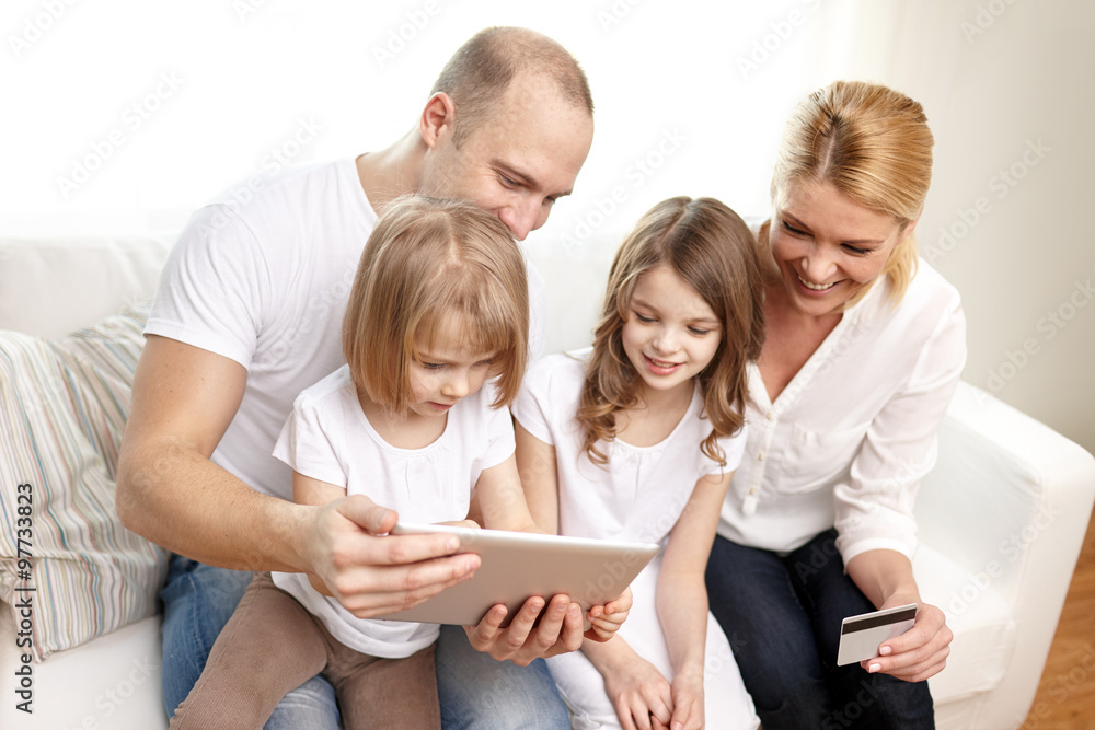 happy family with tablet pc and credit card happy family with tablet pc and credit card