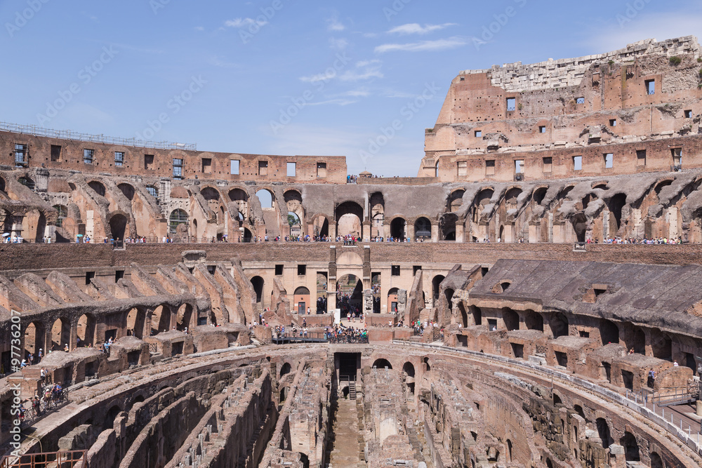 ROME - August 1: Ruins of the Colosseum and tourists in Rome on