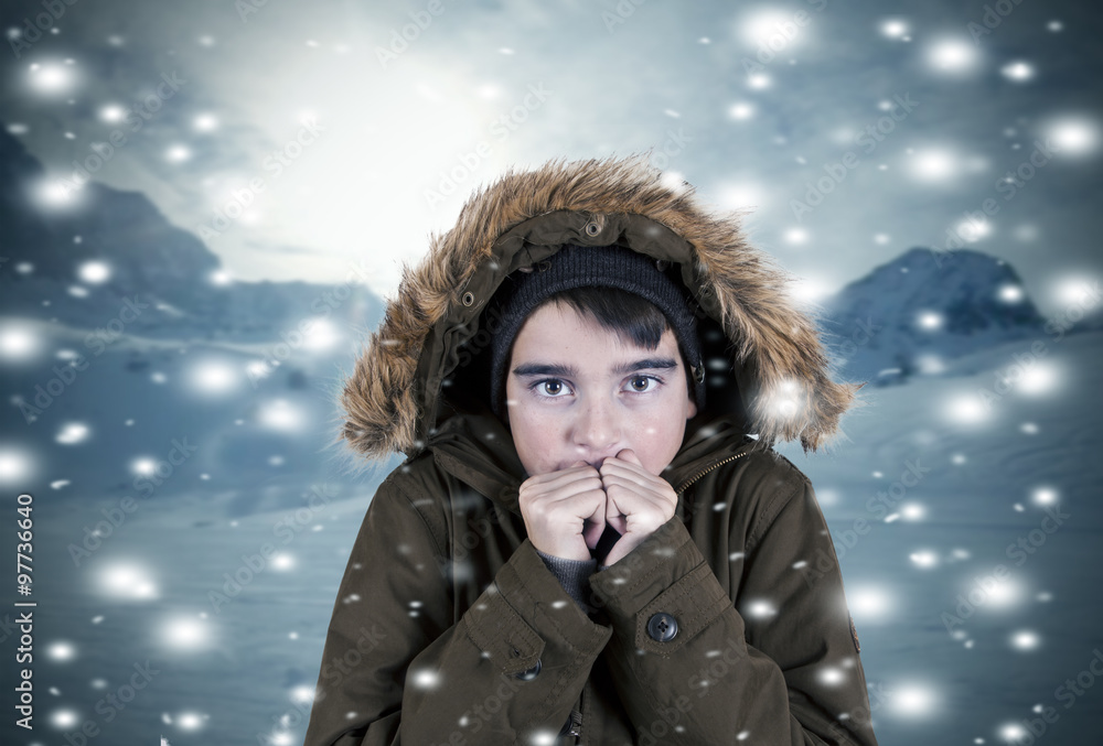 child covered with coat in winter landscape child covered with coat in winter landscape