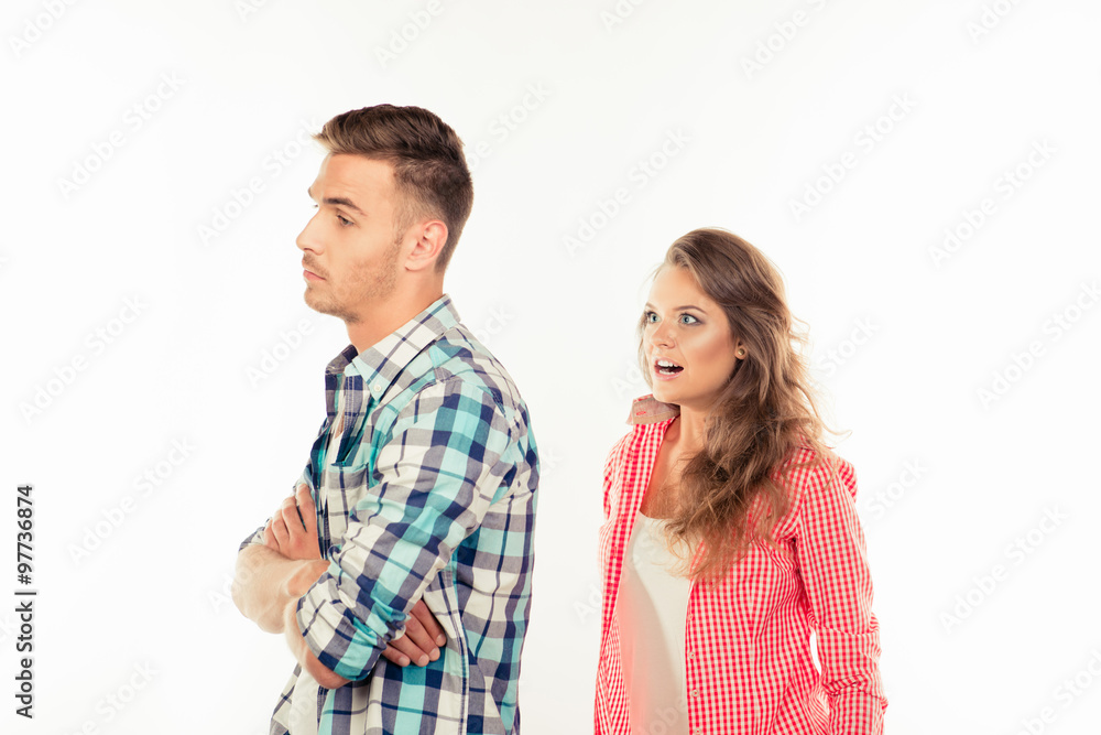 Annoyed young woman shouting at her boyfriend Annoyed young woman shouting at her boyfriend