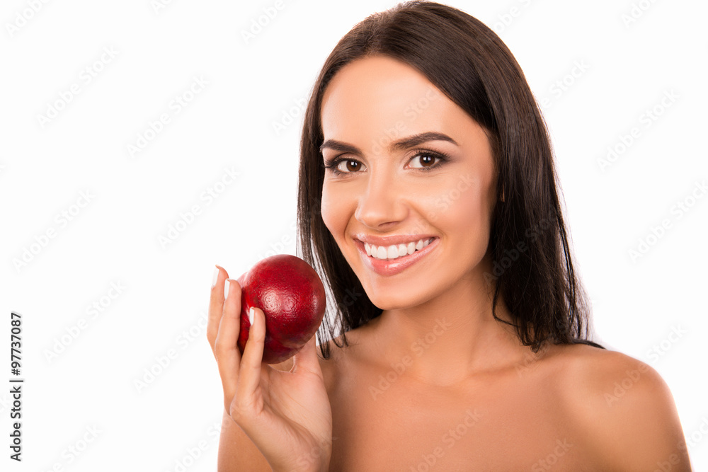 Cheerful beautiful healthy girl holding a nectarine Cheerful beautiful healthy girl holding a nectarine