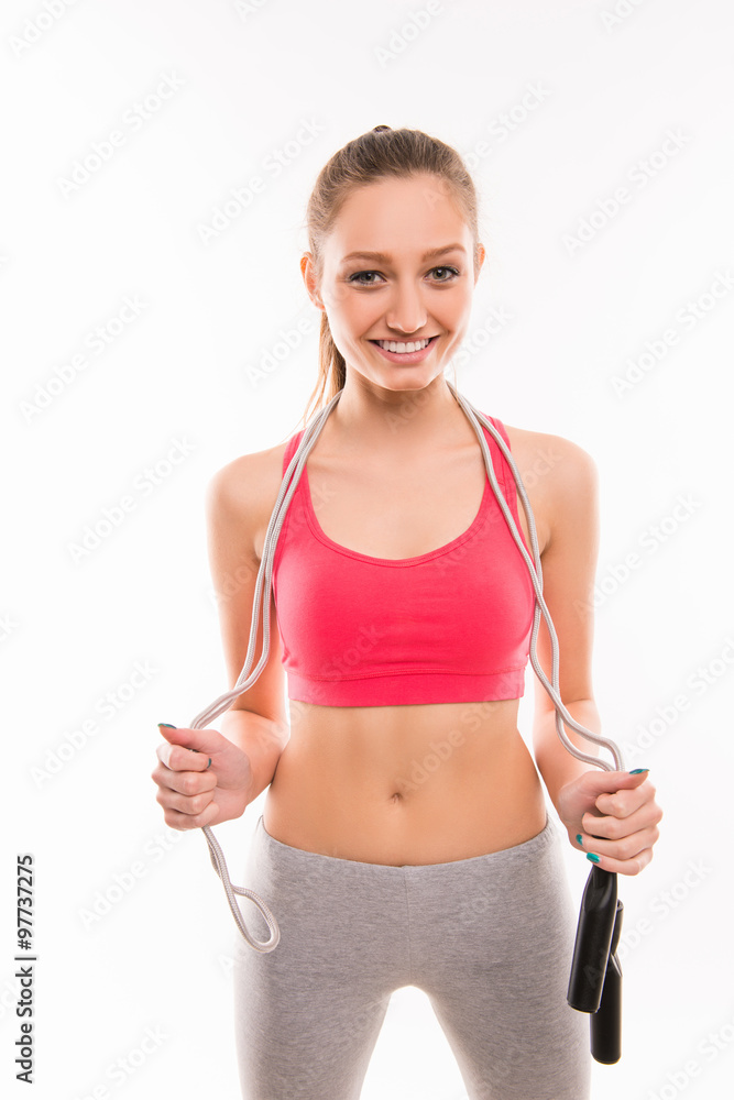 Portrait of slim young girl with skipping-rope Portrait of slim young girl with skipping-rope