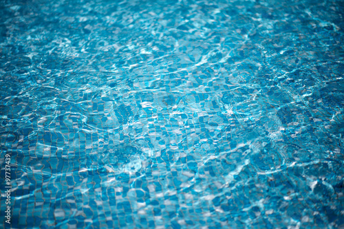 Pure blue water in the pool. Water background.