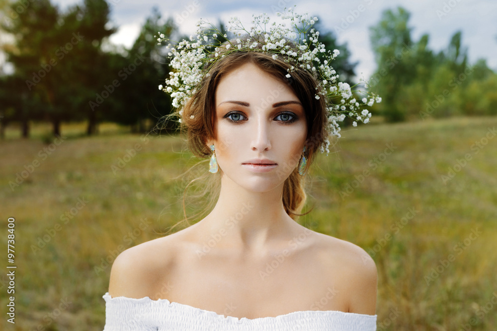 Close up portrait of woman face wearing floral white wreath outdoors Close up portrait of woman face wearing floral white wreath outdoors