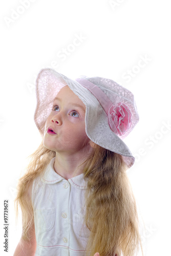 Young blonde girl with white hat