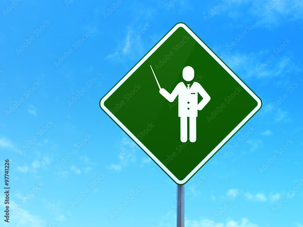 Studying concept: Teacher on road sign background Studying concept: Teacher on road sign background