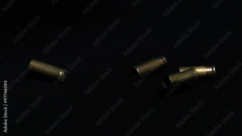 Bullet shells falling in slow motion Bullet shells falling in slow motion