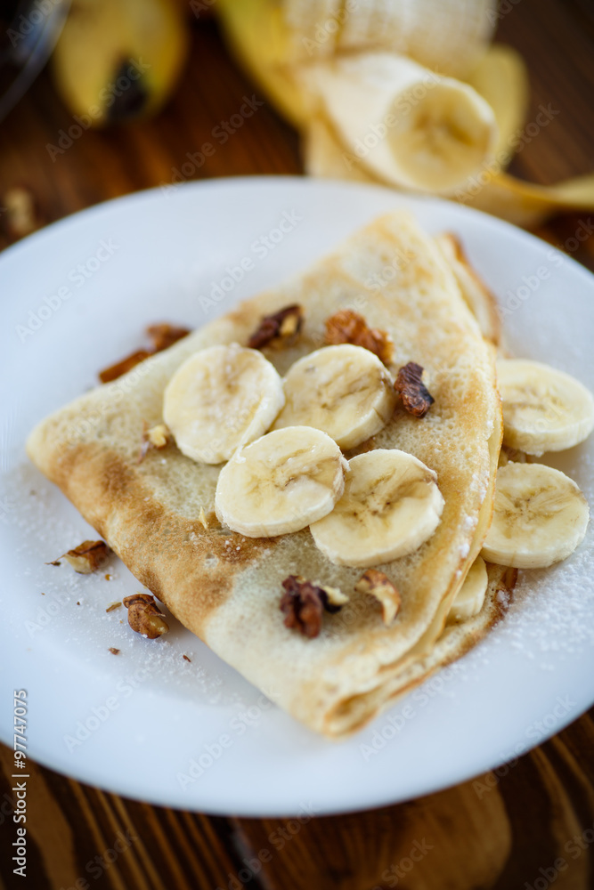 sweet pancakes with bananas and nuts 