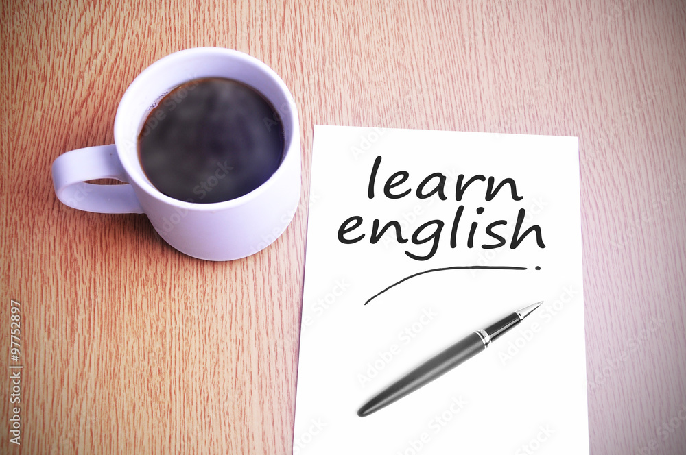 Coffee on the table with note writing learn english Coffee on the table with note writing learn english