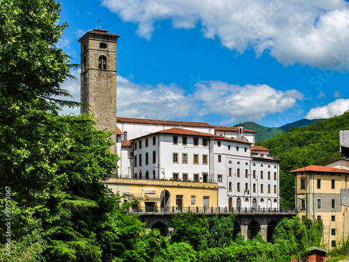 Old medieval tower and houses in Castelnuovo di Garfagnana, a small village in Tuscany