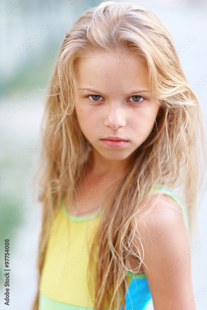 portrait of little girl outdoors in summer portrait of little girl outdoors in summer
