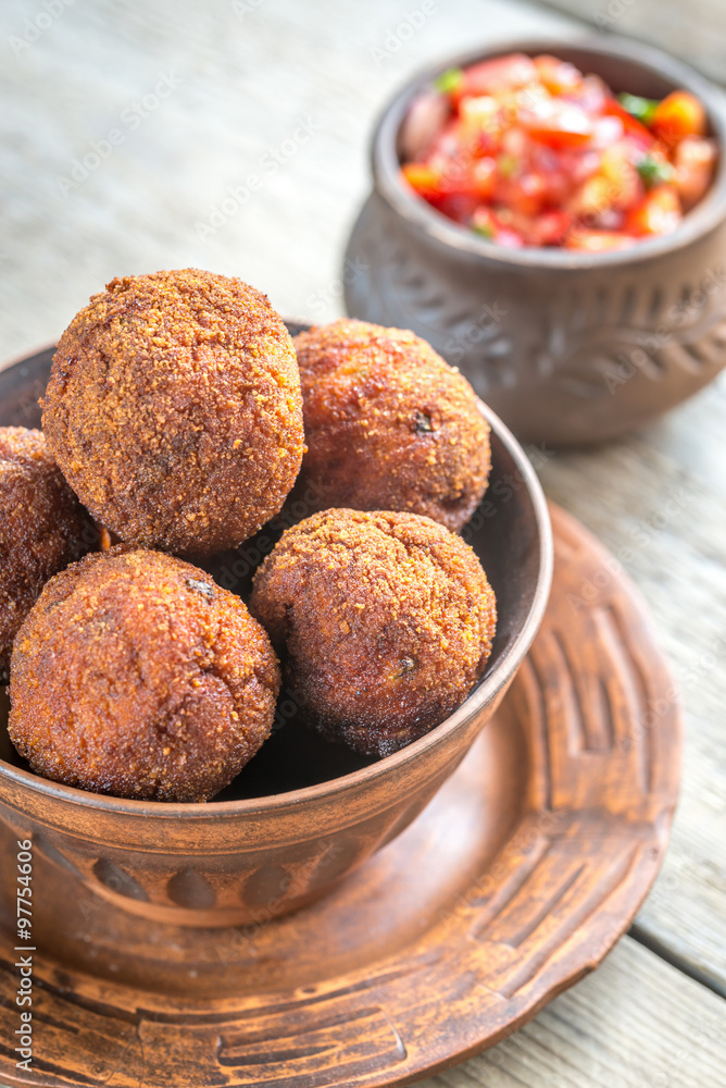 Bowl of meatballs with mexican sauce salsa Bowl of meatballs with mexican sauce salsa