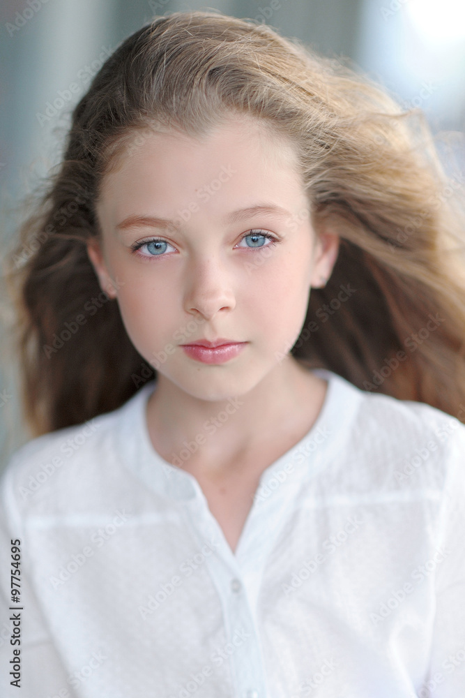 Fototapeta premium portrait of little girl outdoors in summer