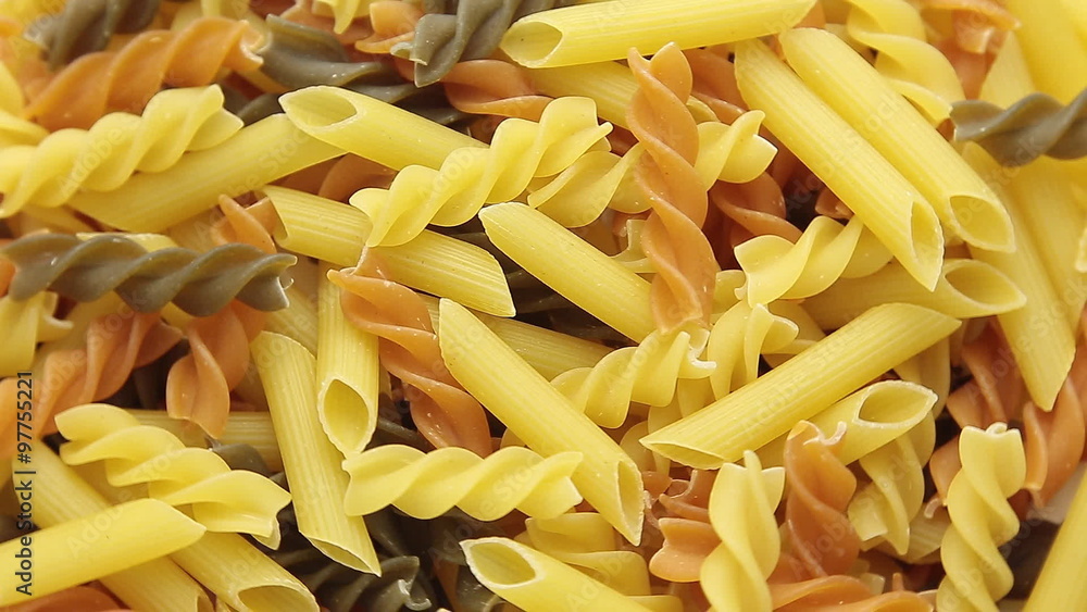 Rotated uncooked Italian macaroni pasta.