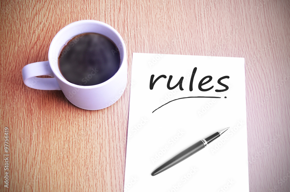 Coffee on the table with note writing rules Coffee on the table with note writing rules