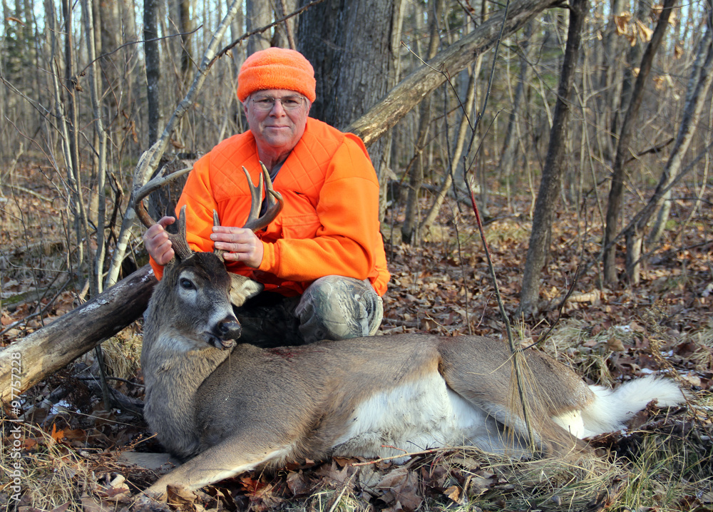 Naklejka premium Deer Hunter With a Ten Point Whitetail Buck