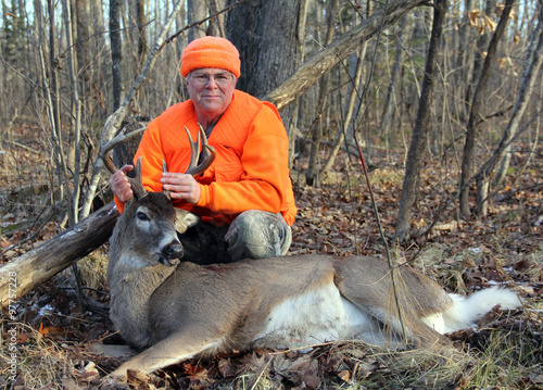 Deer Hunter With a Ten Point Whitetail Buck