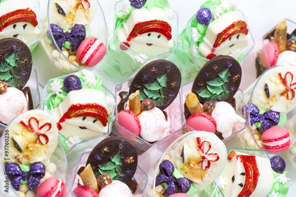 Christmas dessert canapes with cream and chocolate on a white background