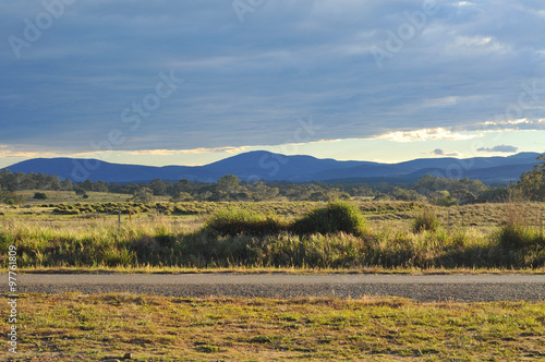 Landscape of NSW countryside with hills in the background.