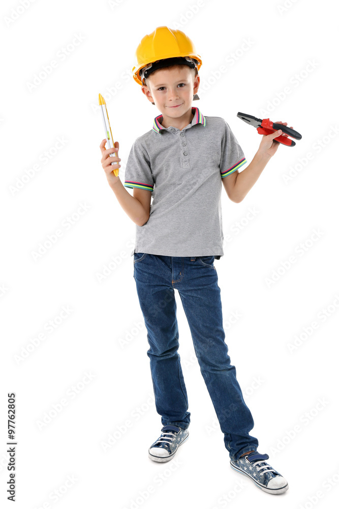 Little boy in yellow helmet with building equipment isolated on white background Little boy in yellow helmet with building equipment isolated on white background