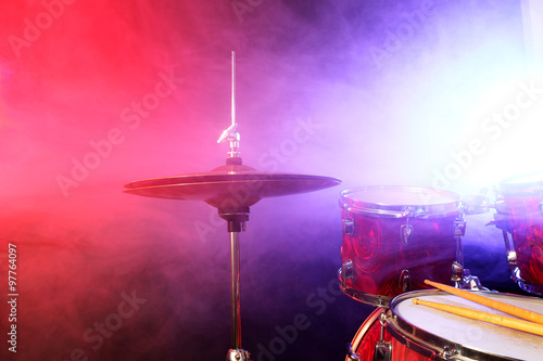 Drums cymbal on smoked stage  close-up