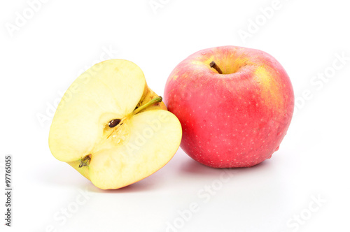 Red apple and slice on a white background