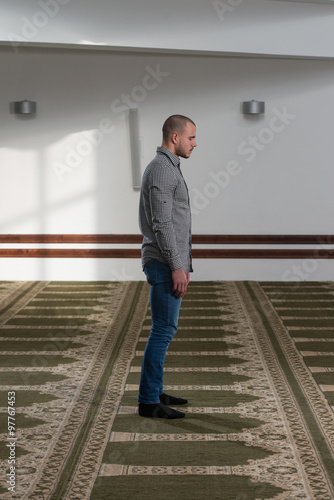 Young Muslim Guy Praying