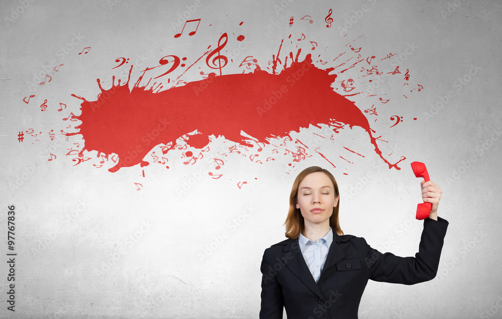 Woman with red handset